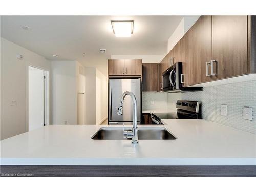 102-479 Charlton Avenue E, Hamilton, ON - Indoor Photo Showing Kitchen With Stainless Steel Kitchen With Double Sink With Upgraded Kitchen