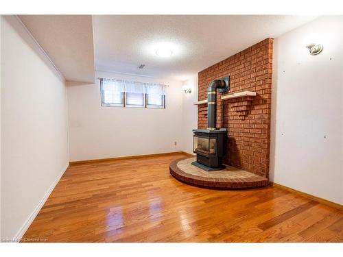 Lower-7 Fox Run, Brantford, ON - Indoor Photo Showing Other Room With Fireplace