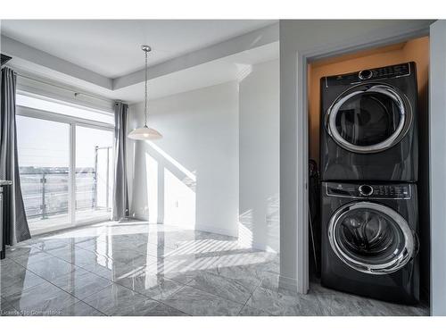 202-30 Times Square Boulevard, Hamilton, ON - Indoor Photo Showing Laundry Room