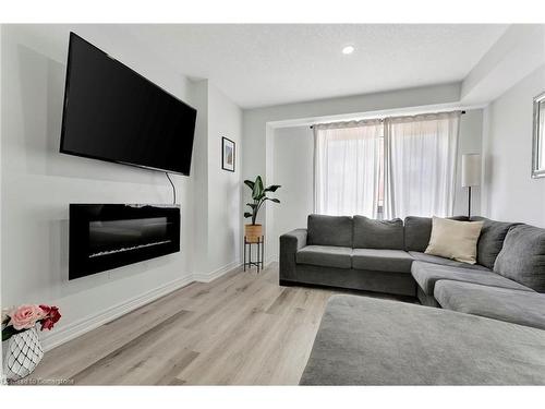 37-41 Radison Lane, Hamilton, ON - Indoor Photo Showing Living Room With Fireplace