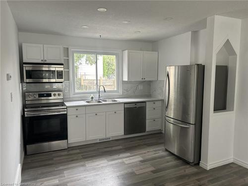 Upper-16 Courtland Avenue, Hamilton, ON - Indoor Photo Showing Kitchen With Double Sink