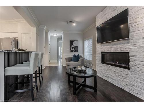 5032 Mercer Common, Burlington, ON - Indoor Photo Showing Living Room With Fireplace