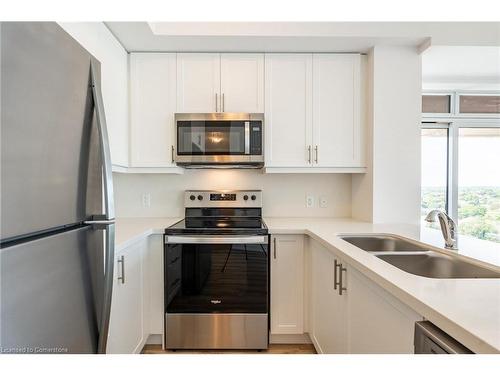 902-470 Dundas Street E, Waterdown, ON - Indoor Photo Showing Kitchen With Double Sink