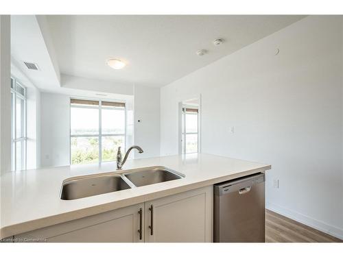 902-470 Dundas Street E, Waterdown, ON - Indoor Photo Showing Kitchen With Double Sink