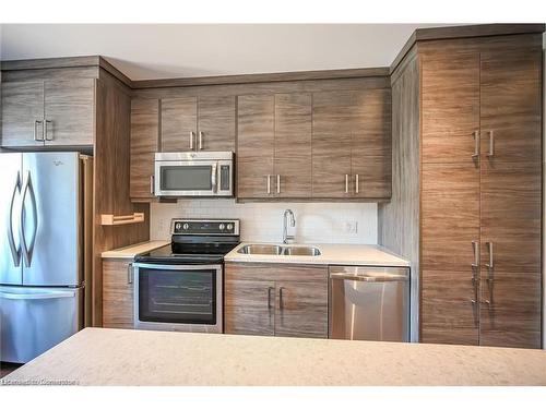 208-2 King Street W, Dundas, ON - Indoor Photo Showing Kitchen With Stainless Steel Kitchen With Double Sink