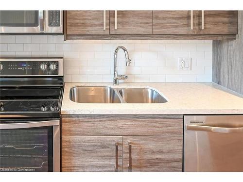 208-2 King Street W, Dundas, ON - Indoor Photo Showing Kitchen With Double Sink