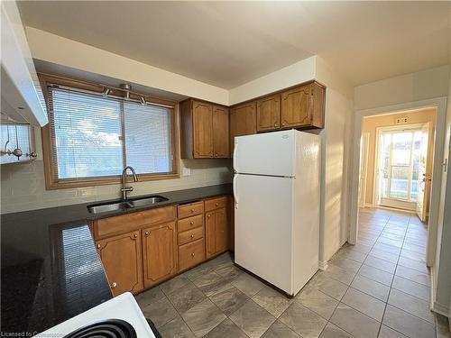 Upper-148 Oakland Drive, Hamilton, ON - Indoor Photo Showing Kitchen With Double Sink