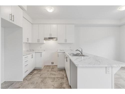 17 Daffodil Road, Springwater, ON - Indoor Photo Showing Kitchen With Double Sink