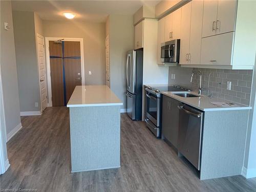 520-128 Grovewood Common, Oakville, ON - Indoor Photo Showing Kitchen With Stainless Steel Kitchen With Upgraded Kitchen