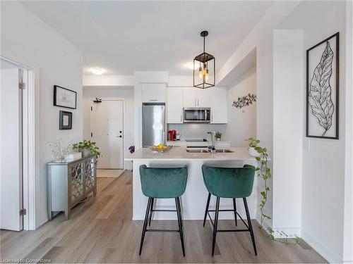 301-600 North Service Road, Stoney Creek, ON - Indoor Photo Showing Kitchen With Double Sink