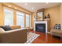 2402 Curtis Road, Burlington, ON  - Indoor Photo Showing Living Room With Fireplace 