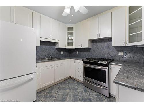 46 Graham Avenue S, Hamilton, ON - Indoor Photo Showing Kitchen With Double Sink