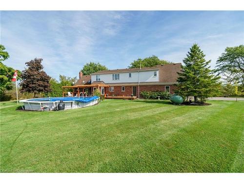 1040 Caistor Centre Road, West Lincoln, ON - Outdoor With Above Ground Pool With Backyard