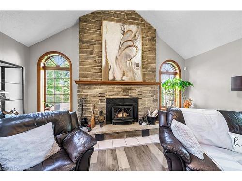 1040 Caistor Centre Road, West Lincoln, ON - Indoor Photo Showing Living Room With Fireplace