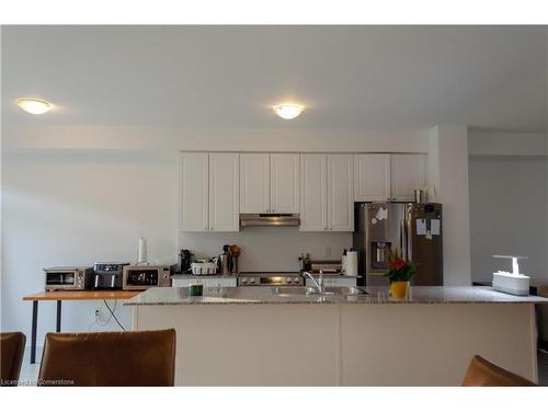 4-2481 Badger Crescent, Oakville, ON - Indoor Photo Showing Kitchen With Double Sink