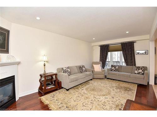 59 Holimont Court, Hamilton, ON - Indoor Photo Showing Living Room With Fireplace