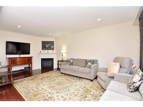 59 Holimont Court, Hamilton, ON - Indoor Photo Showing Living Room With Fireplace