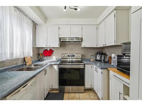 116-11 Harrisford Street, Hamilton, ON - Indoor Photo Showing Kitchen With Double Sink