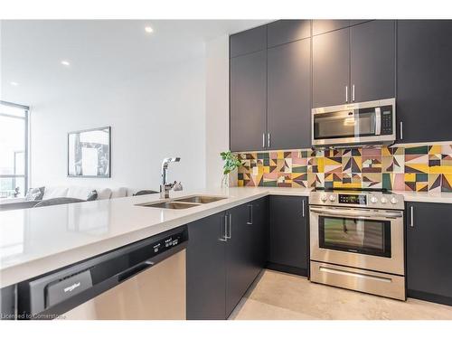 606-101 Locke Street S, Hamilton, ON - Indoor Photo Showing Kitchen With Double Sink With Upgraded Kitchen