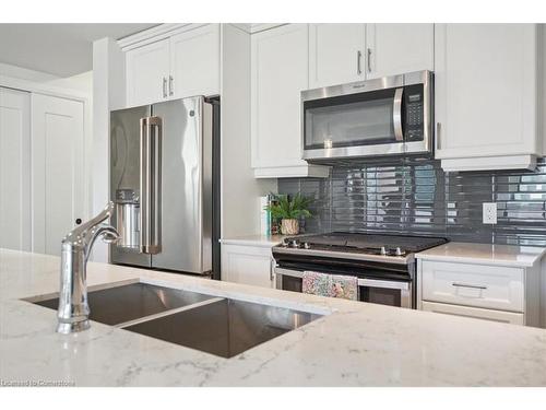 509-181 James Street N, Hamilton, ON - Indoor Photo Showing Kitchen With Double Sink With Upgraded Kitchen