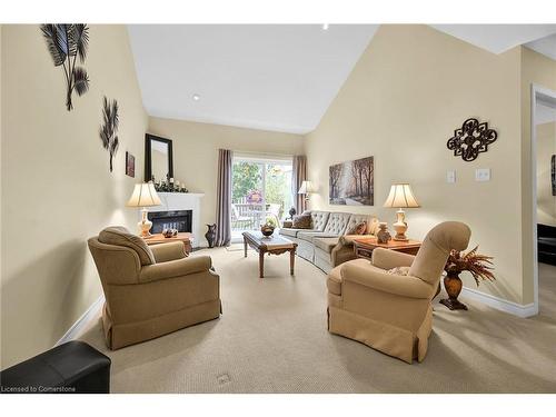 69 Mapleleaf Trail, Glanbrook, ON - Indoor Photo Showing Living Room With Fireplace