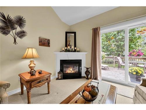 69 Mapleleaf Trail, Glanbrook, ON - Indoor Photo Showing Living Room With Fireplace