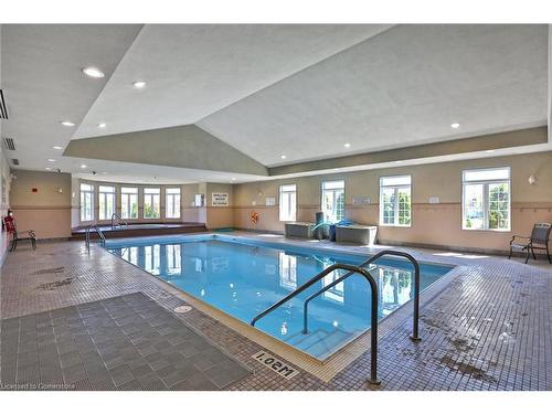 69 Mapleleaf Trail, Glanbrook, ON - Indoor Photo Showing Other Room With In Ground Pool