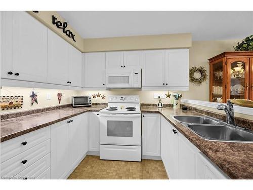 69 Mapleleaf Trail, Glanbrook, ON - Indoor Photo Showing Kitchen With Double Sink