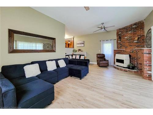 940 Hutchinson Rd Road, Lowbanks, ON - Indoor Photo Showing Living Room With Fireplace