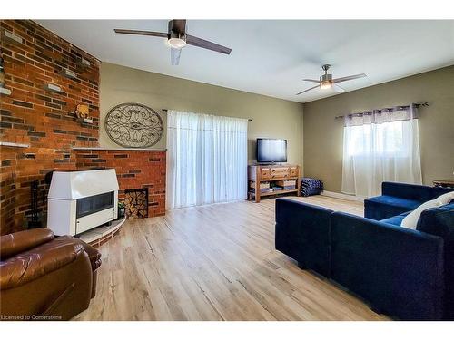 940 Hutchinson Rd Road, Lowbanks, ON - Indoor Photo Showing Living Room With Fireplace