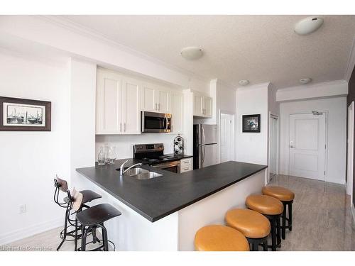 608-101 Shoreview Place, Stoney Creek, ON - Indoor Photo Showing Kitchen With Double Sink