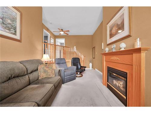 28 Titan Drive, Stoney Creek, ON - Indoor Photo Showing Living Room With Fireplace