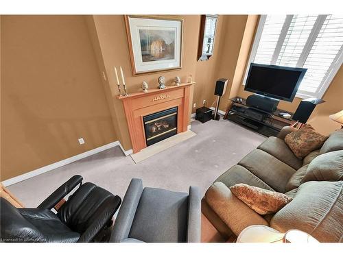 28 Titan Drive, Stoney Creek, ON - Indoor Photo Showing Living Room With Fireplace