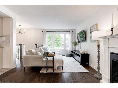 22 Garden Crescent, Hamilton, ON - Indoor Photo Showing Living Room With Fireplace