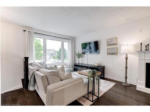 22 Garden Crescent, Hamilton, ON - Indoor Photo Showing Living Room With Fireplace