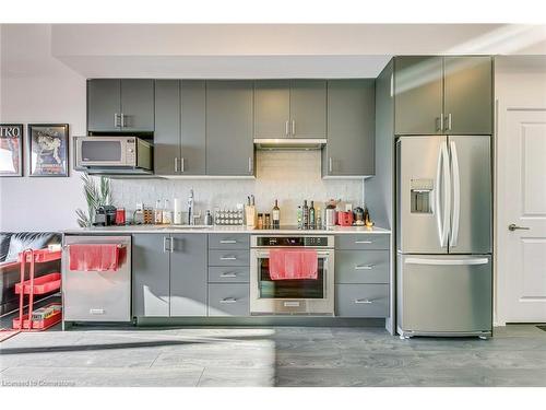 325-3220 William Colston Avenue N, Oakville, ON - Indoor Photo Showing Kitchen With Stainless Steel Kitchen