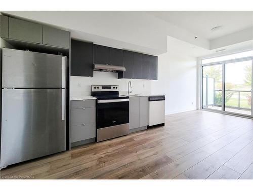 A108-3210 Dakota Common, Burlington, ON - Indoor Photo Showing Kitchen With Stainless Steel Kitchen