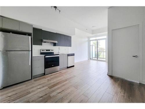 A108-3210 Dakota Common, Burlington, ON - Indoor Photo Showing Kitchen With Stainless Steel Kitchen