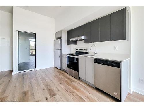 A108-3210 Dakota Common, Burlington, ON - Indoor Photo Showing Kitchen With Stainless Steel Kitchen