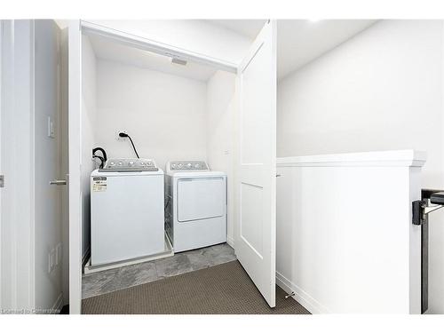 70-30 Times Square Boulevard, Hamilton, ON - Indoor Photo Showing Laundry Room