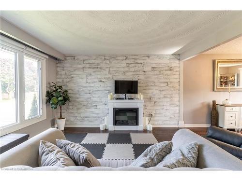 59 Regent Avenue, Hamilton, ON - Indoor Photo Showing Living Room With Fireplace