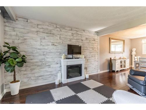 59 Regent Avenue, Hamilton, ON - Indoor Photo Showing Living Room With Fireplace