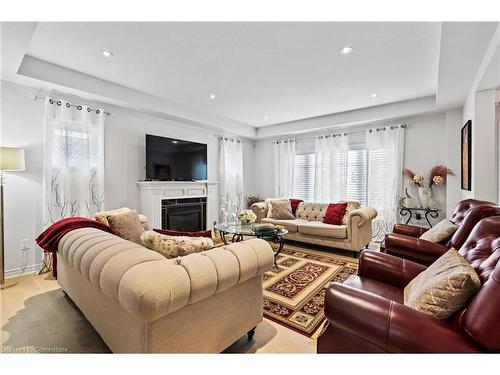 5632 Osprey Avenue, Niagara Falls, ON - Indoor Photo Showing Living Room With Fireplace