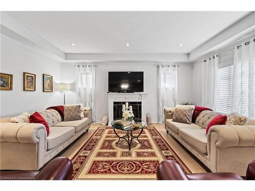 5632 Osprey Avenue, Niagara Falls, ON - Indoor Photo Showing Living Room With Fireplace