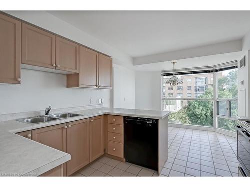 705-2190 Lakeshore Road, Burlington, ON - Indoor Photo Showing Kitchen With Double Sink