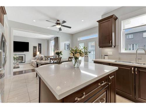 39 Morning Mist Drive, Hamilton, ON - Indoor Photo Showing Kitchen With Fireplace