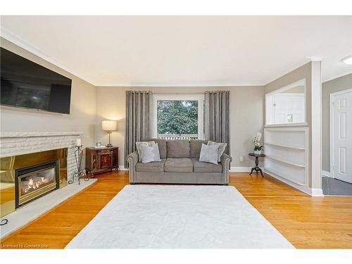 162 Prince Charles Drive, Georgetown, ON - Indoor Photo Showing Living Room With Fireplace