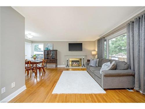 162 Prince Charles Drive, Georgetown, ON - Indoor Photo Showing Living Room With Fireplace