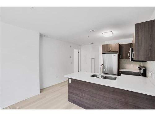 202-467 Charlton Avenue E, Hamilton, ON - Indoor Photo Showing Kitchen With Double Sink