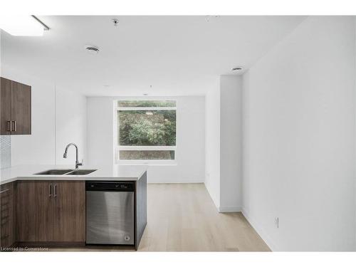 202-467 Charlton Avenue E, Hamilton, ON - Indoor Photo Showing Kitchen With Double Sink